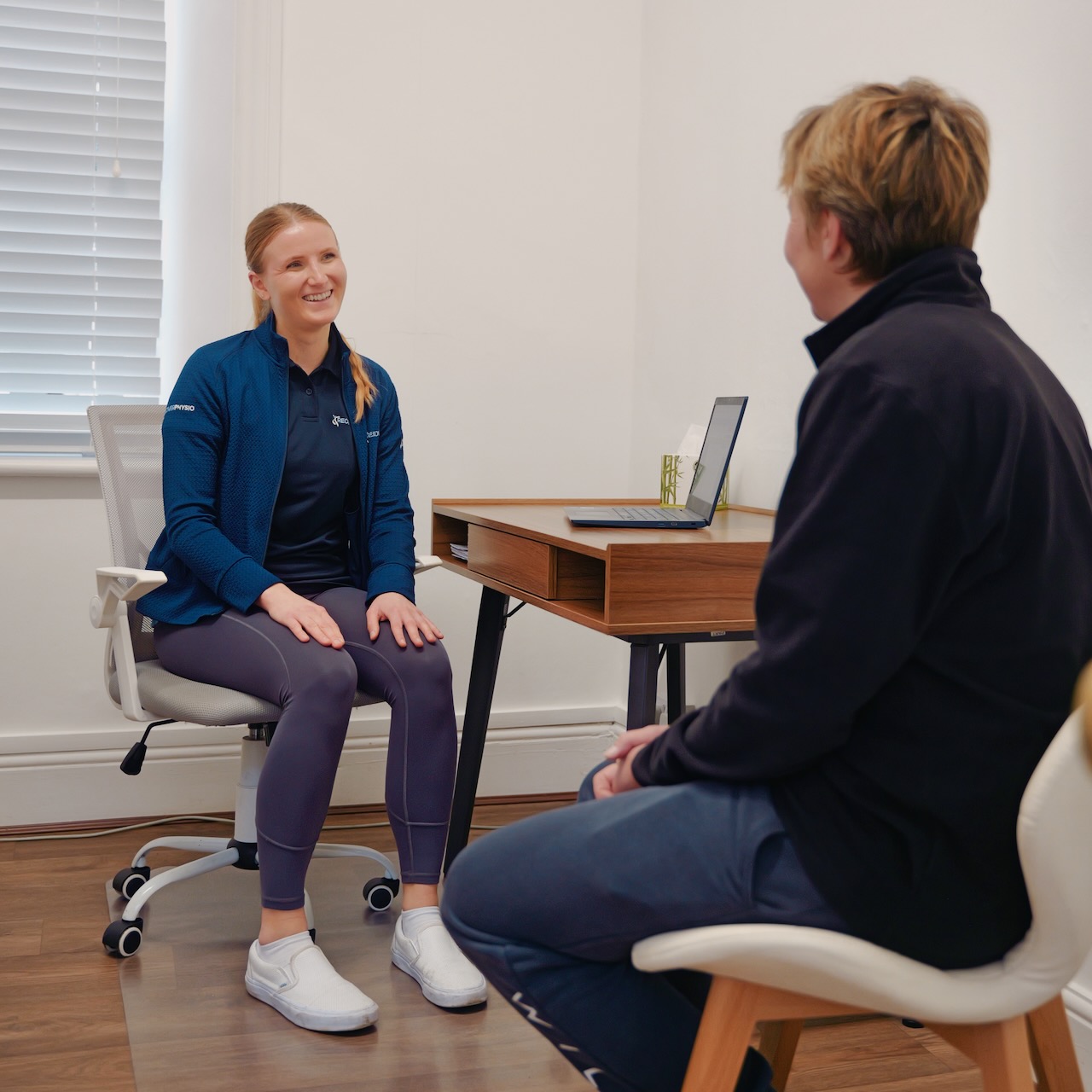 Lindsey conducts a running assessment at Recover Physio in Norwich
